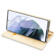 Dux Ducis Skin Pro Case - кожен калъф с поставка и отделение за кр. карти за Samsung Galaxy S22 Ultra (златист) 3